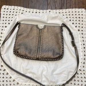 Brighton purse lovingly used by myself. Pewter color. Perfect Cross-body type.